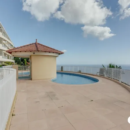 Panoramic View Swimming Pool And Parking Space